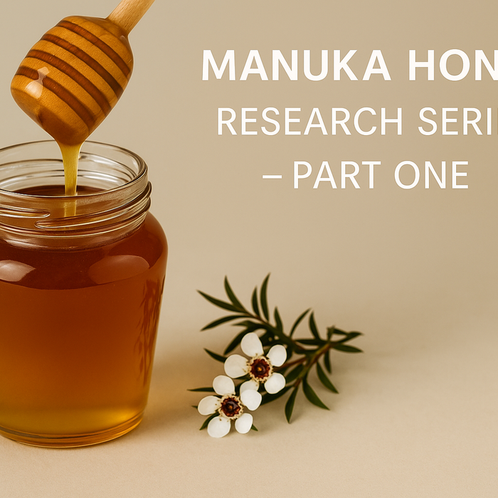 Manuka honey research series part one showing a jar of New Zealand manuka honey with mānuka flowers, representing scientific research into bioactive compounds